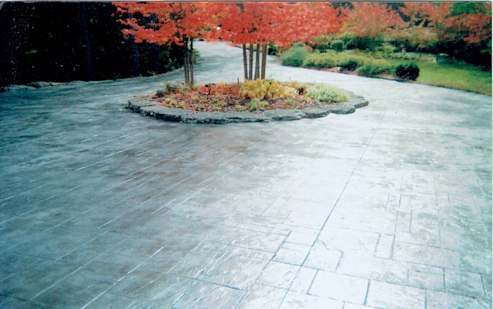 Large sealed stamped concrete driveway